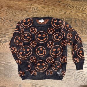 Madhappy Black and Orange Smiley Crewneck Sweater